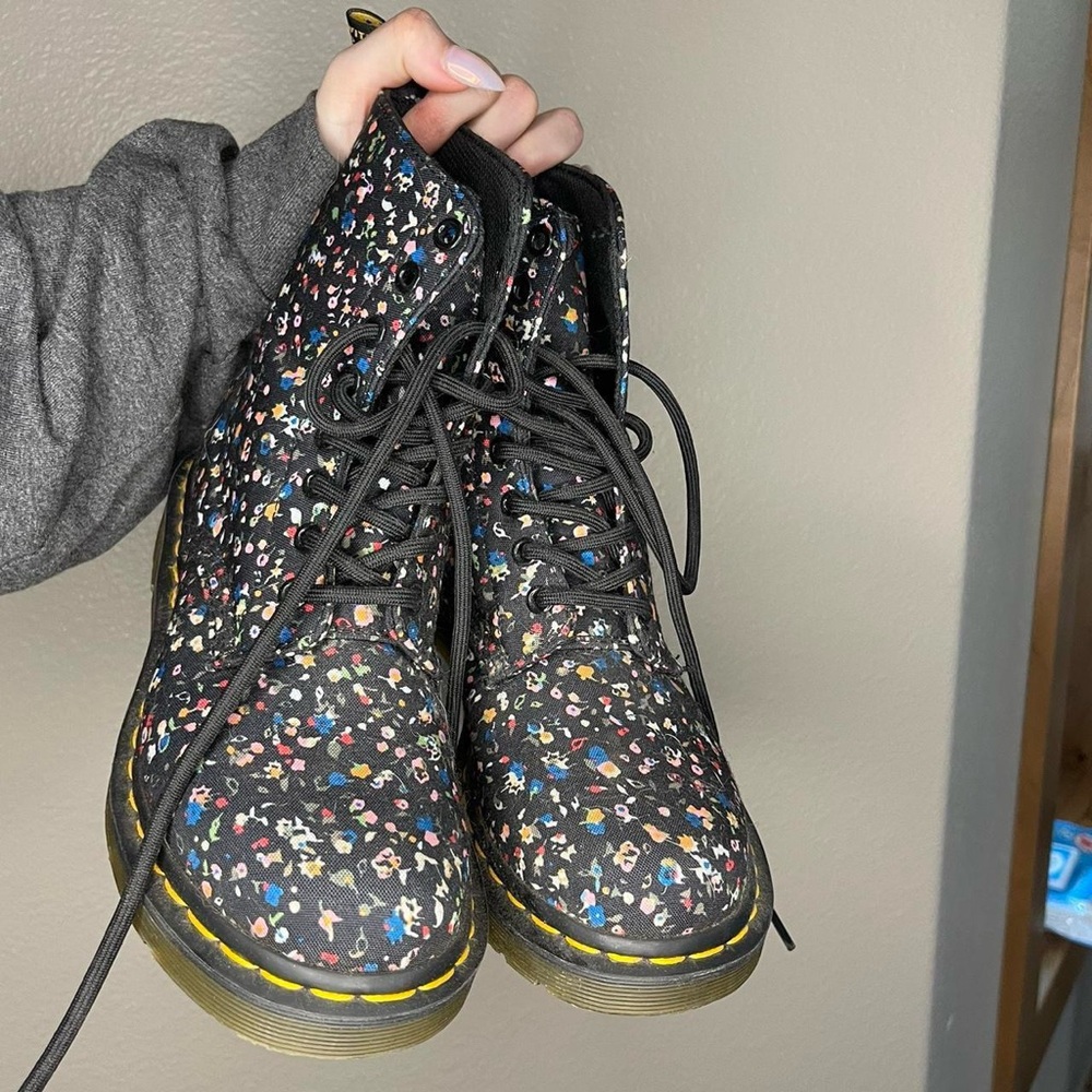 Dr. Martens Black Combat Boots with Lace-Up Style and Thick Sole